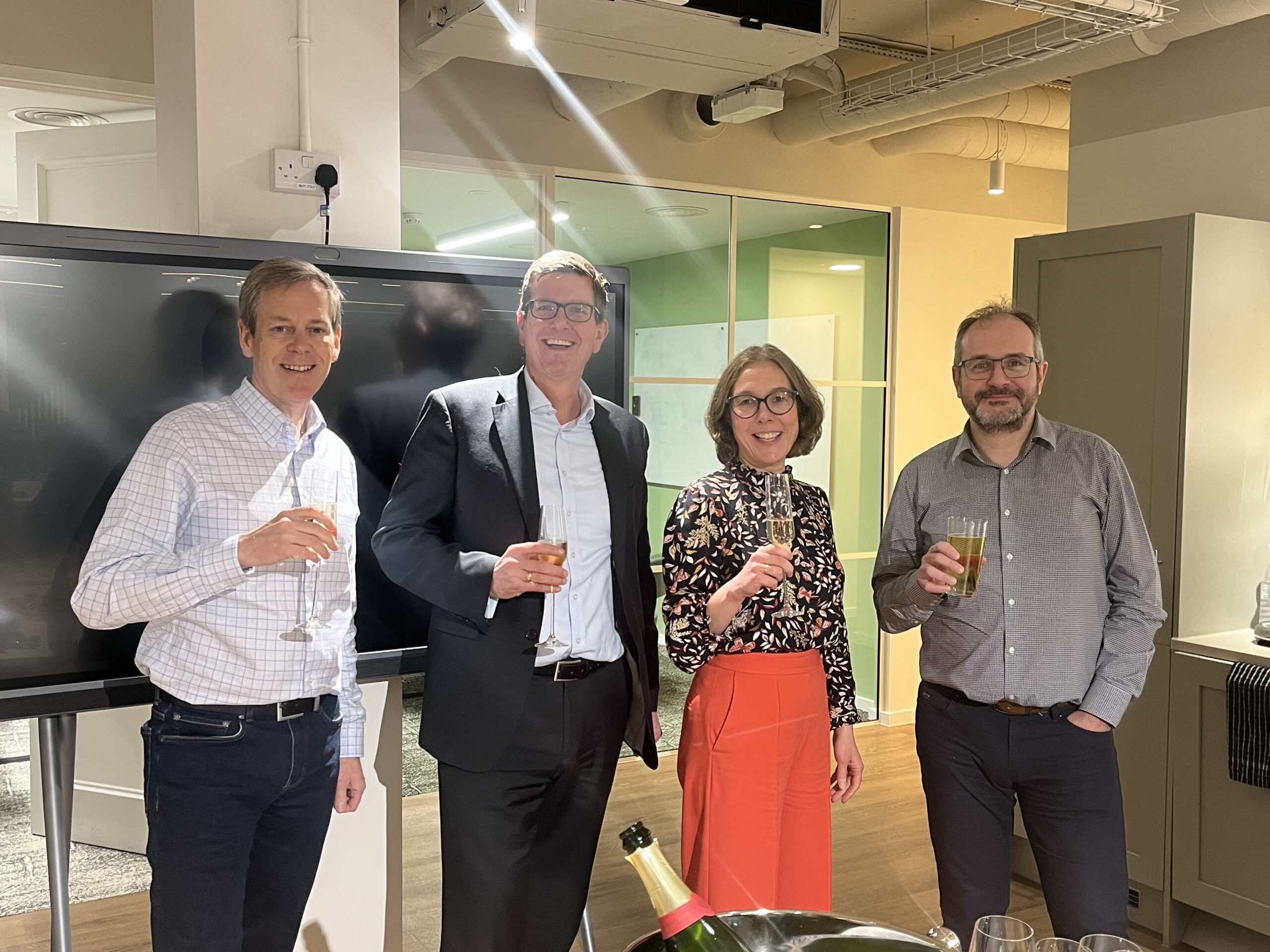 4 corporate people in office