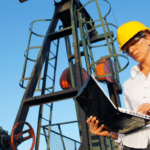 Woman on laptop on site
