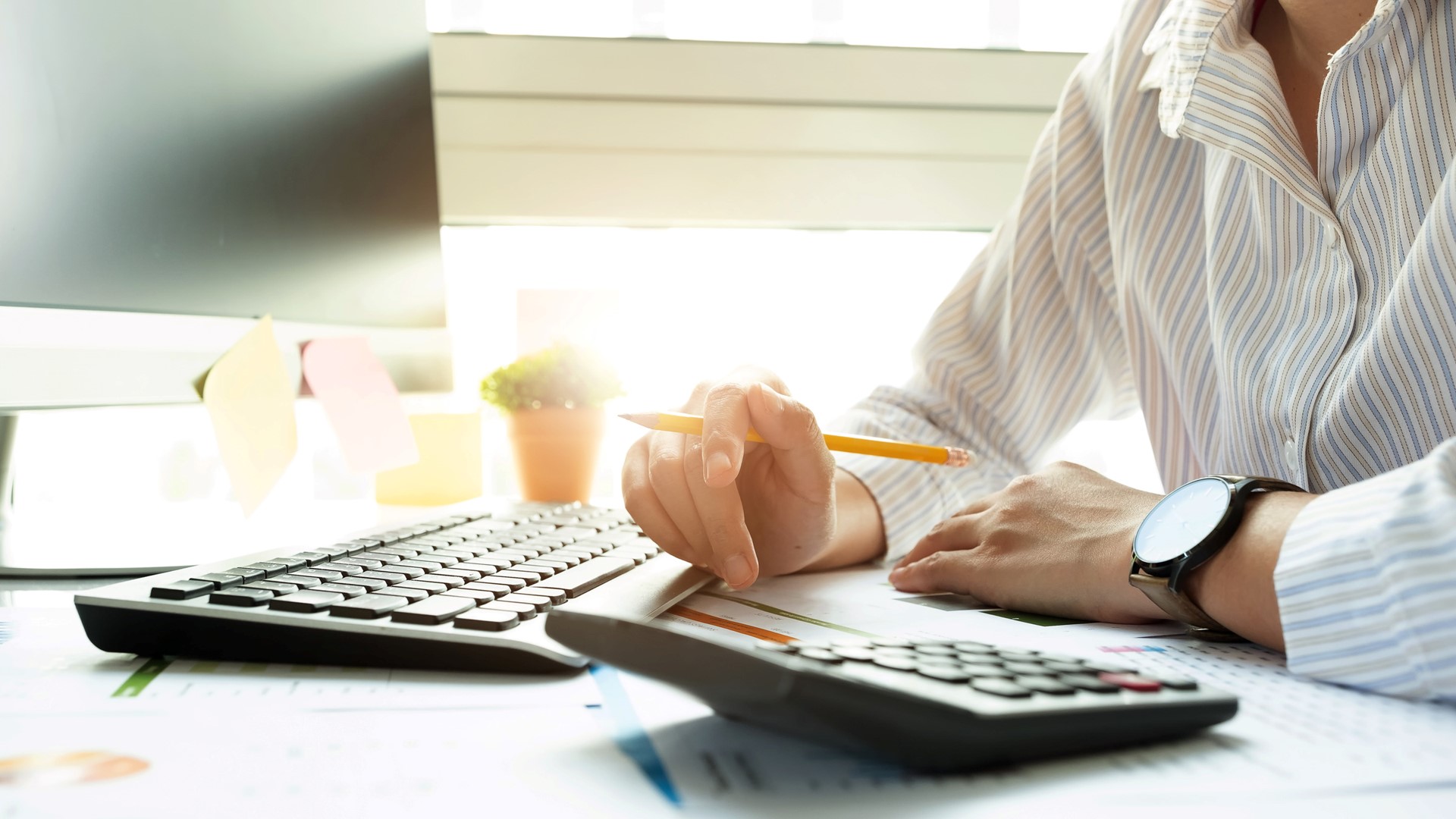 Women in finance at desk